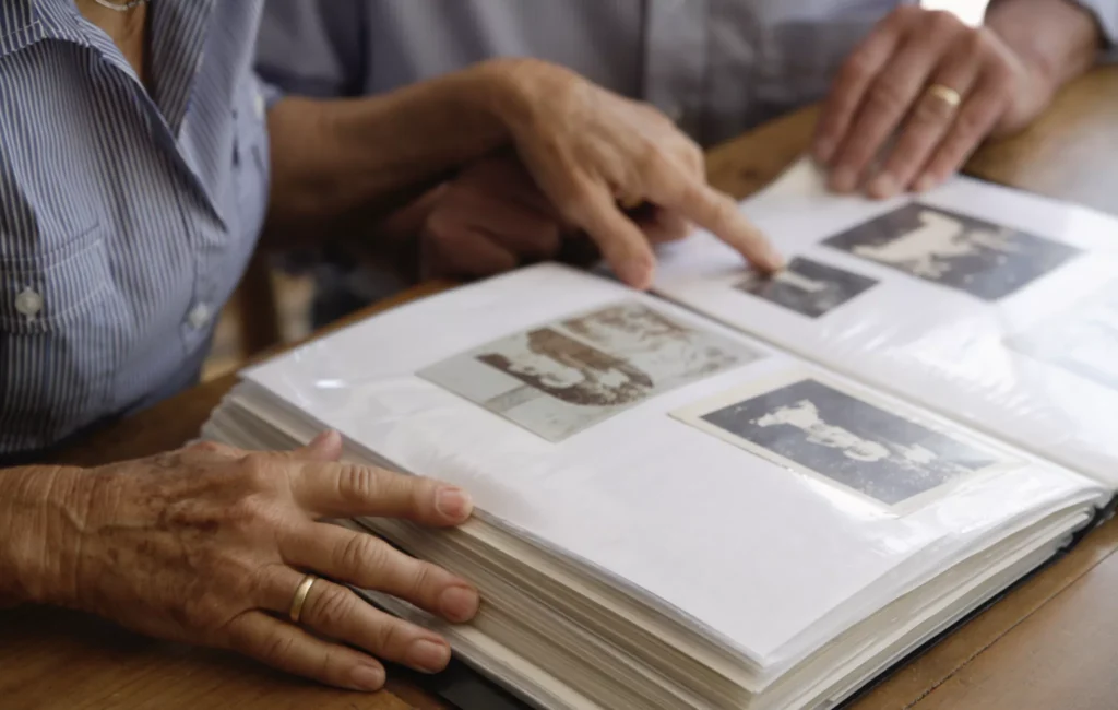 Family genealogy sites help put names to faces in old photo albums like this.