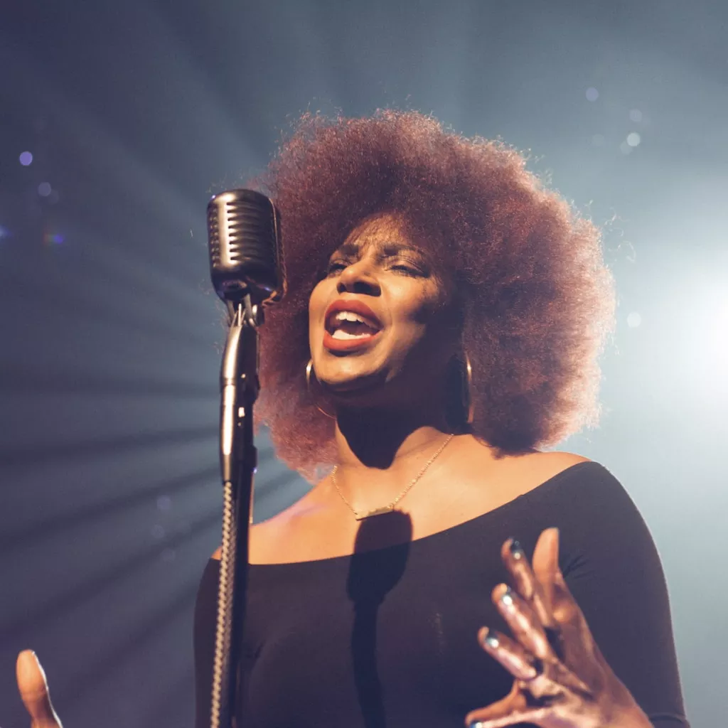 Lady singing.