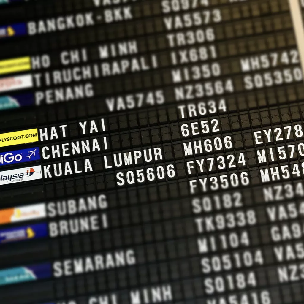 The flight information board at an airport.