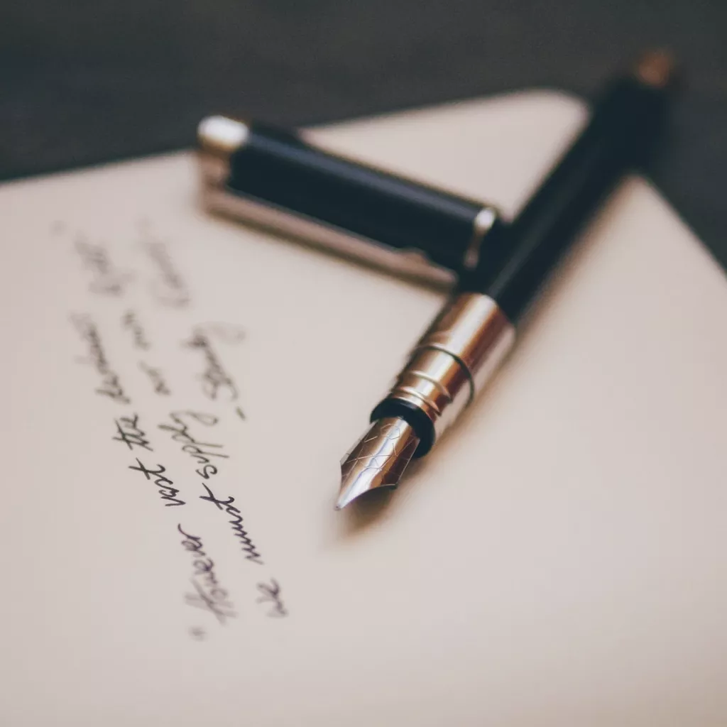 A fountain pen on paper.