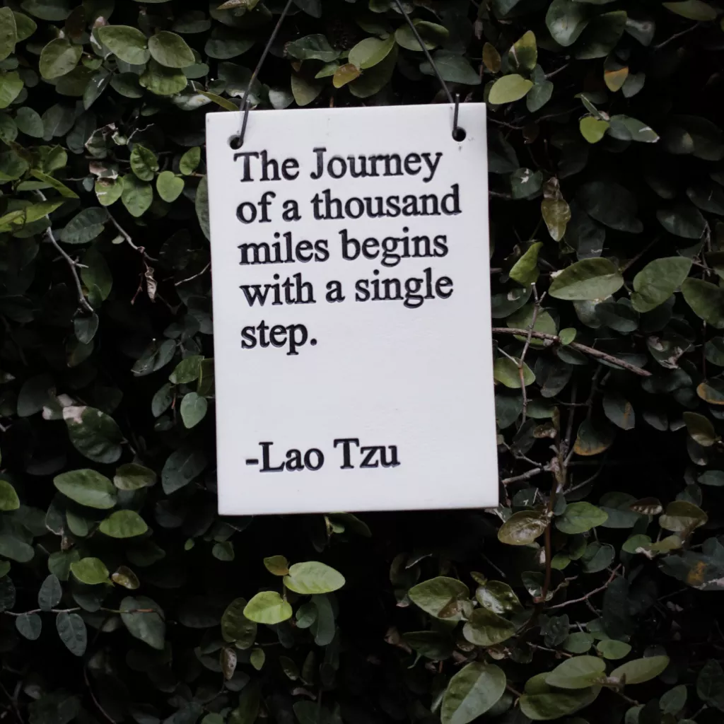 A quote written on a board.