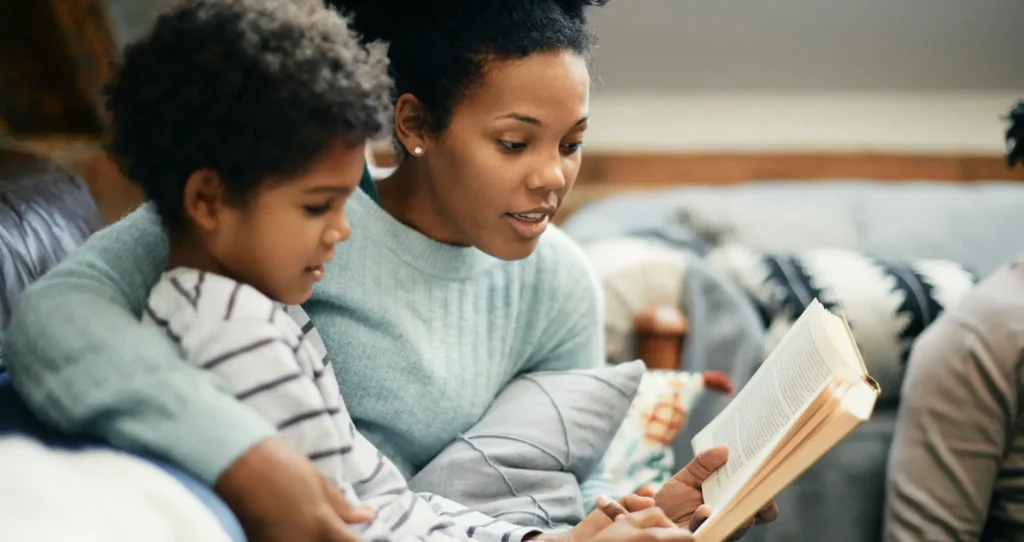 A mother reading to her child.