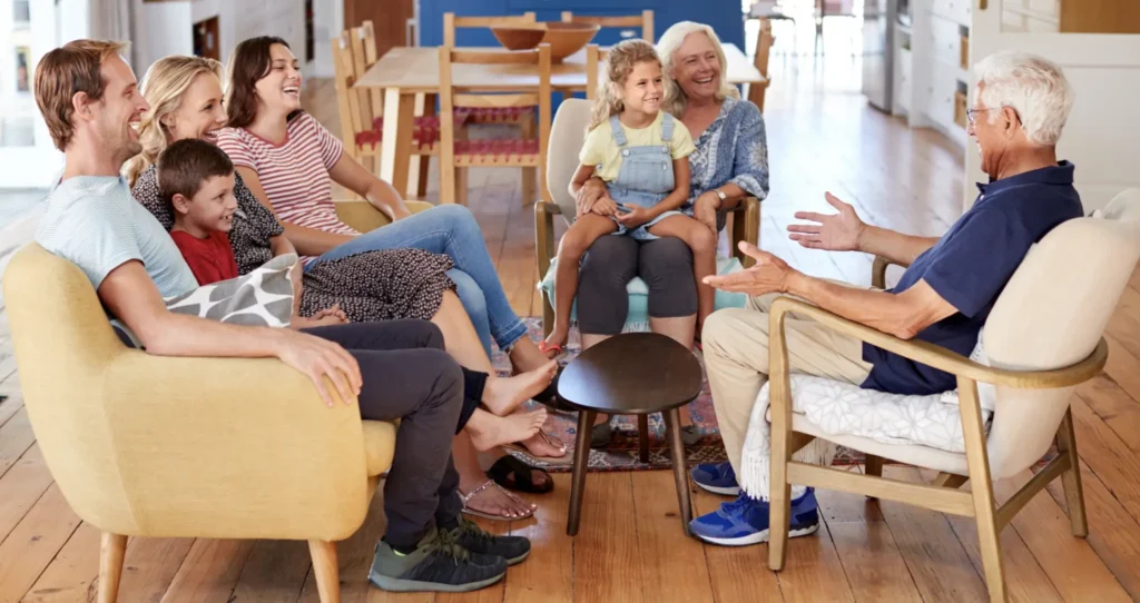 Sharing stories with the game 'first last best worst', as this family is doing, is a great family bonding idea